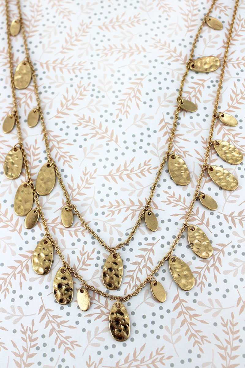 Crave Layered Worn Goldtone Petal Charm Necklace